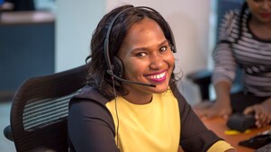 Employees using computers in an office