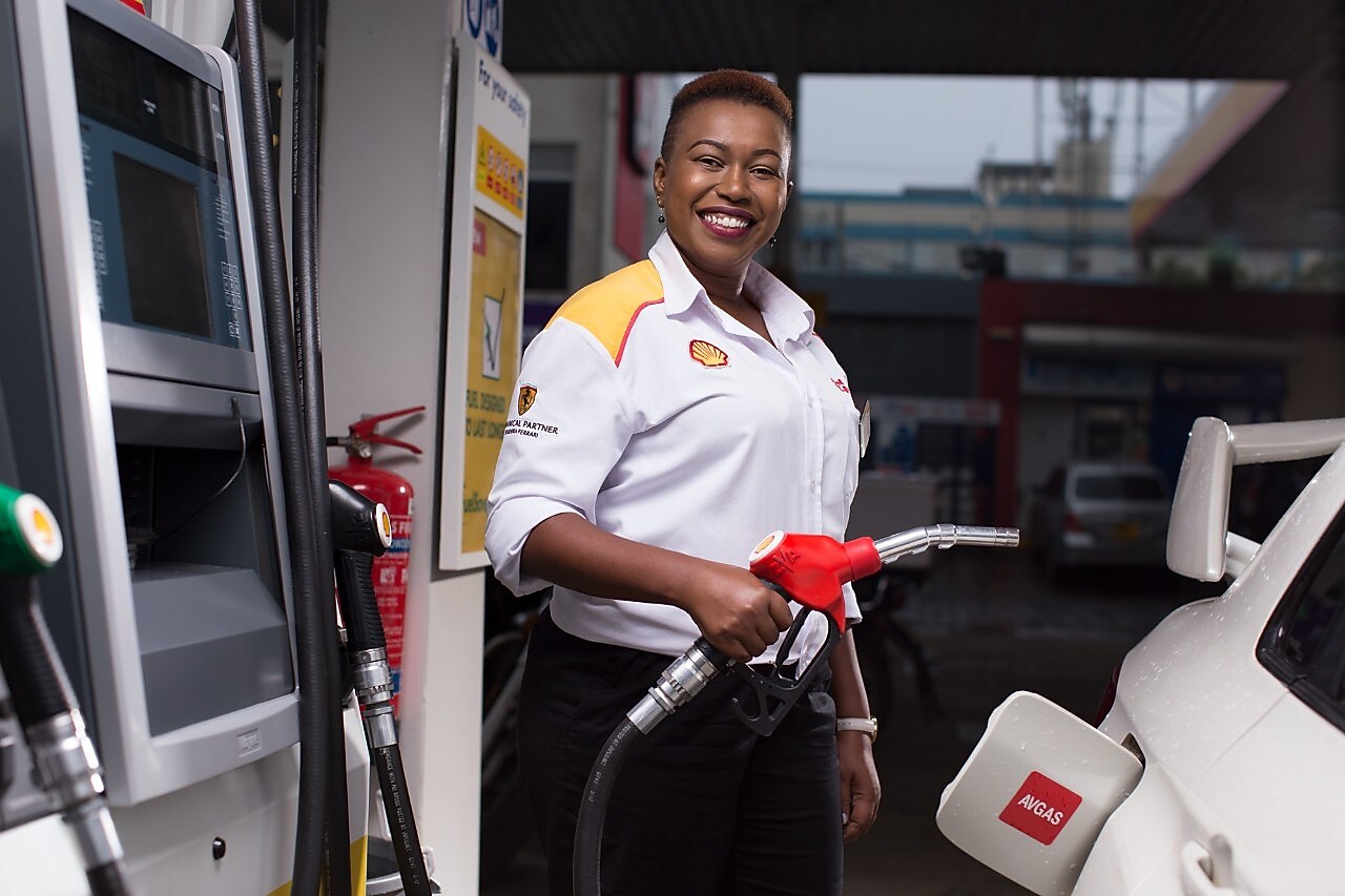 Man refueling his car at a petrol pump
