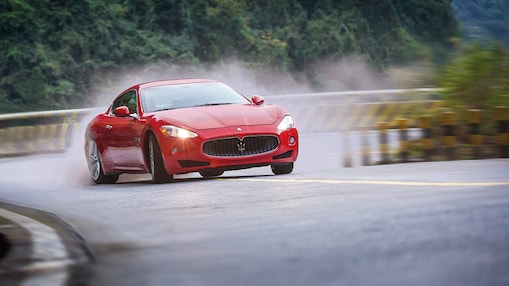 A red Maserati speeds uphill in the Shell Helix Ultra film We Know Why You Drive