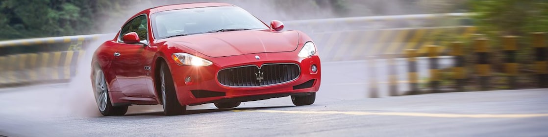 A red Maserati speeds uphill in the Shell Helix Ultra film We Know Why You Drive