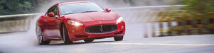 A red Maserati speeds uphill in the Shell Helix Ultra film We Know Why You Drive