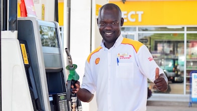 Ugandan customer champion on the forecourt