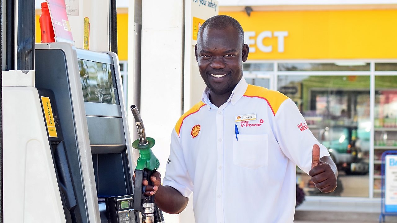 Ugandan customer champion on the forecourt